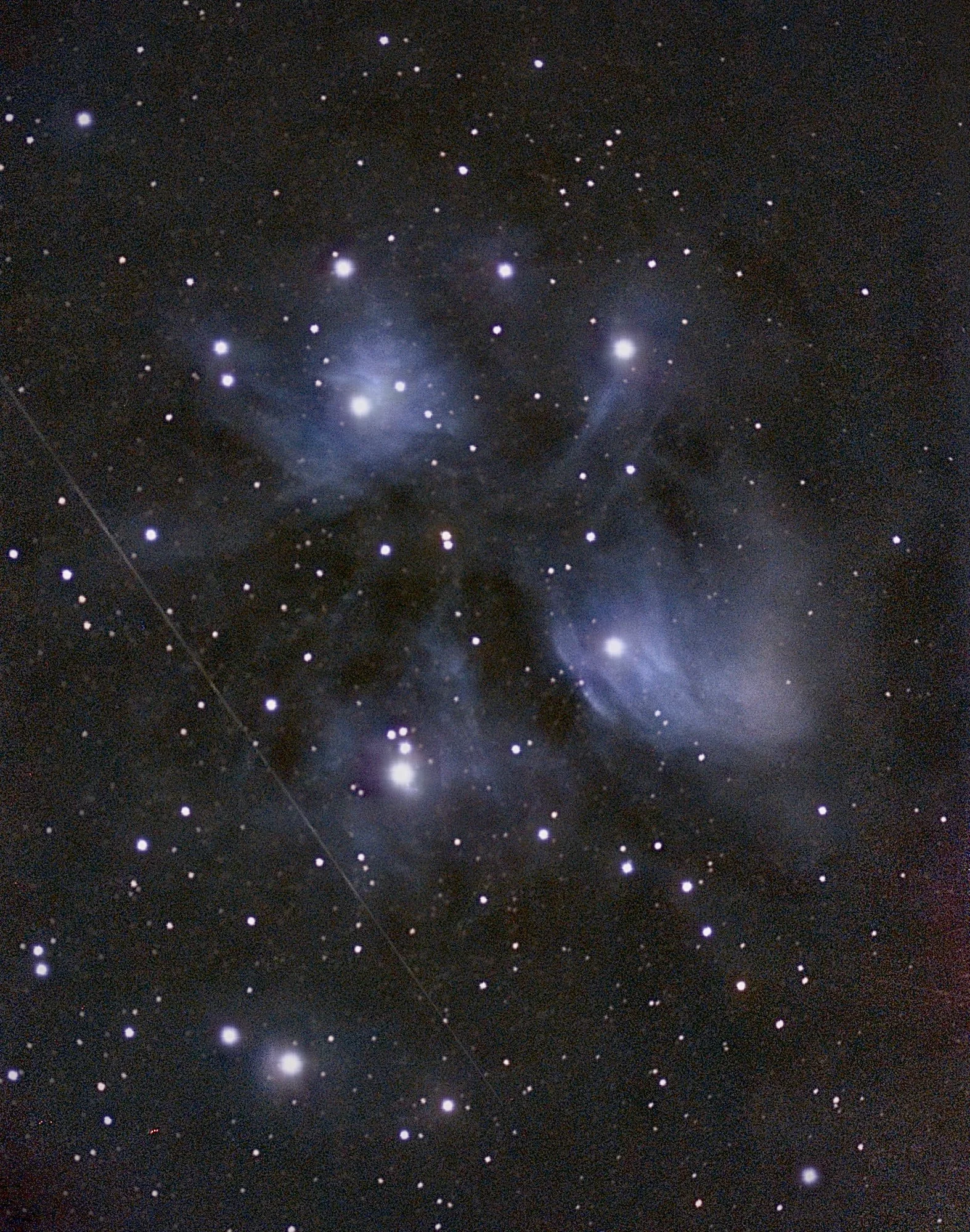 The Pleiades: bright blue stars wrapped in blue haze, a mosaic of several fields
