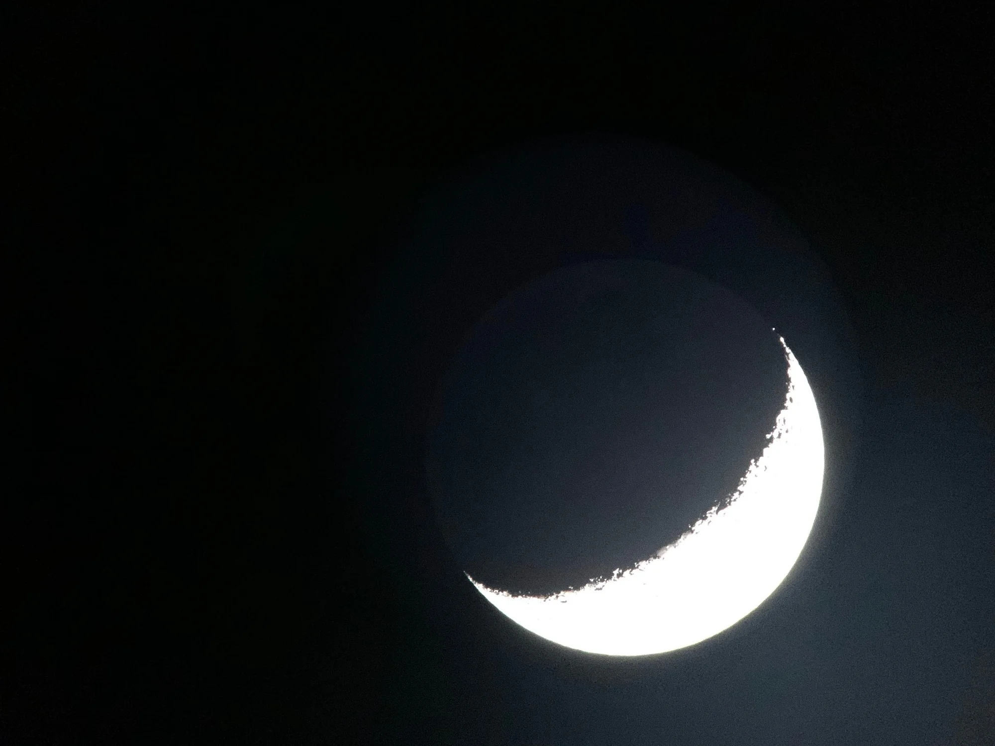 Photograph of a thin crescent Moon