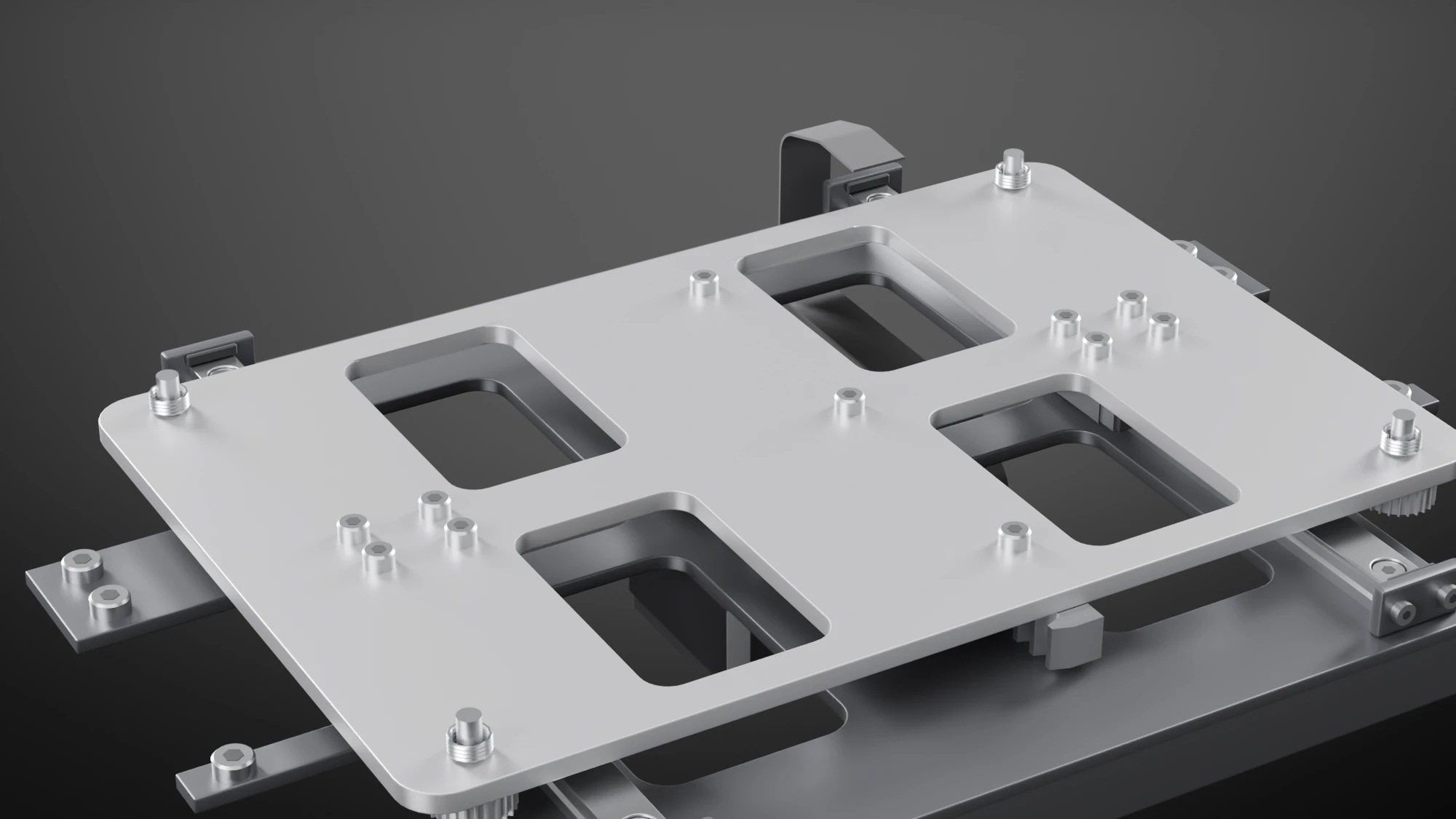 The bed without its plate, seen from above and in front: the carrier with four windows, screw heads over the blocks, four springs on levelling screws, and the tray with a rail and a stop block