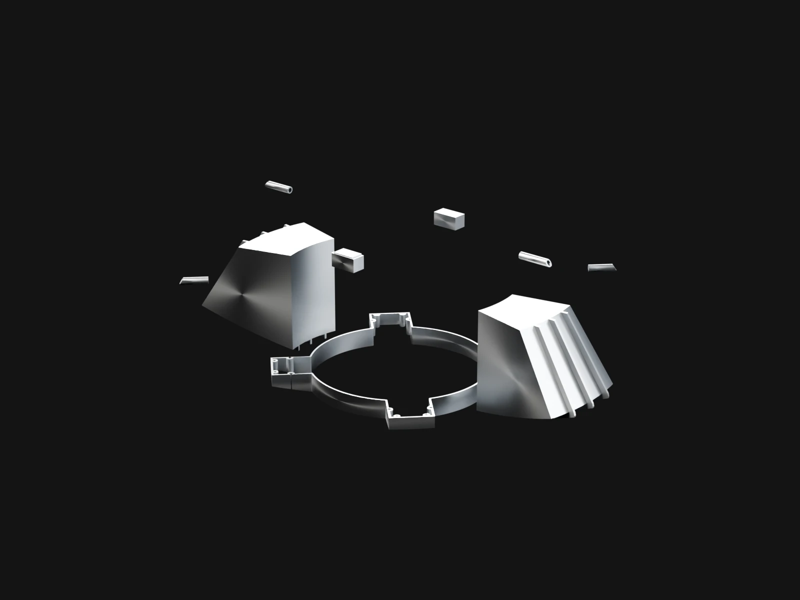 Small silver blocks and brackets spread round a ring