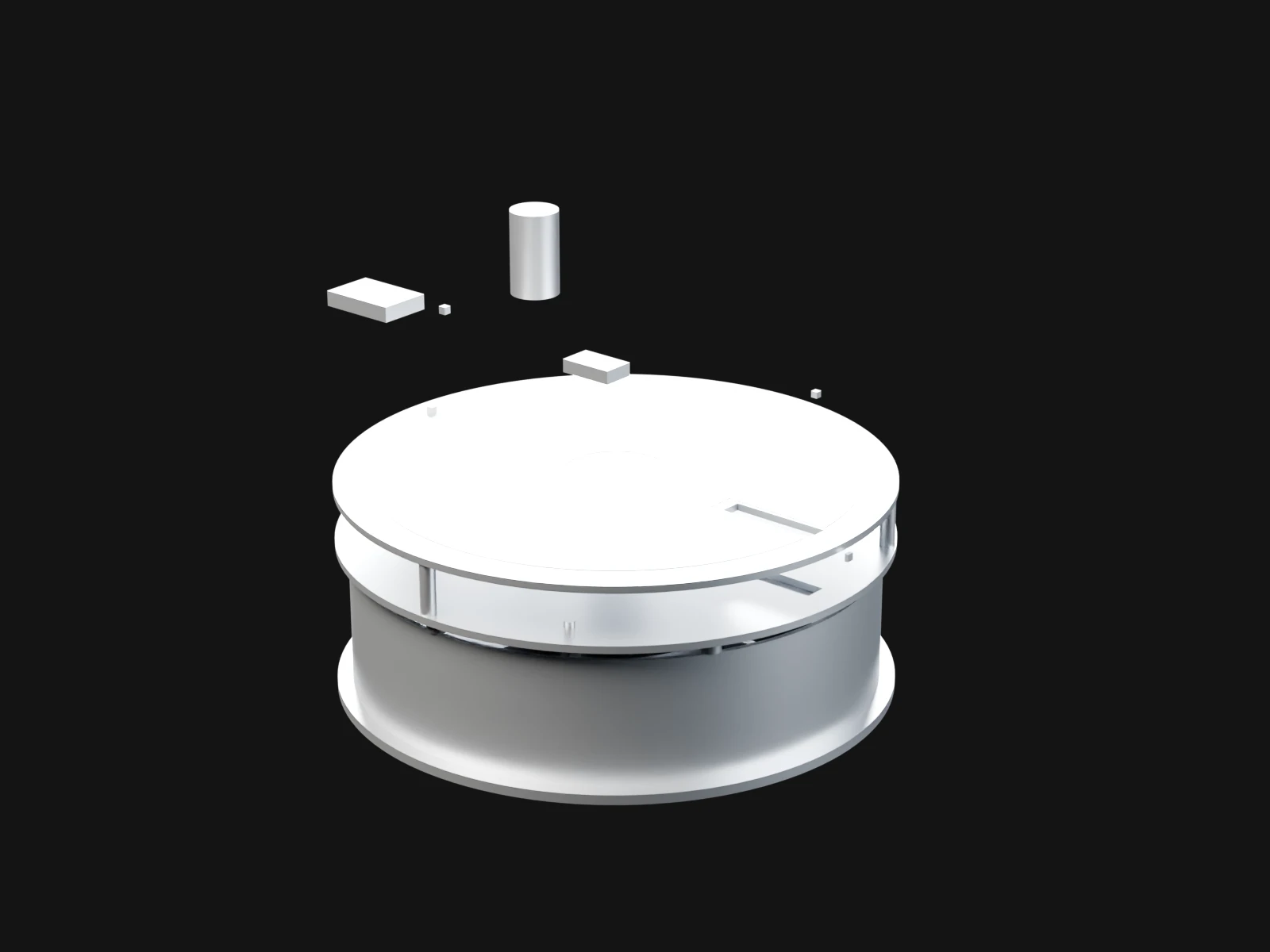 A round silver drum with small sensor blocks above it