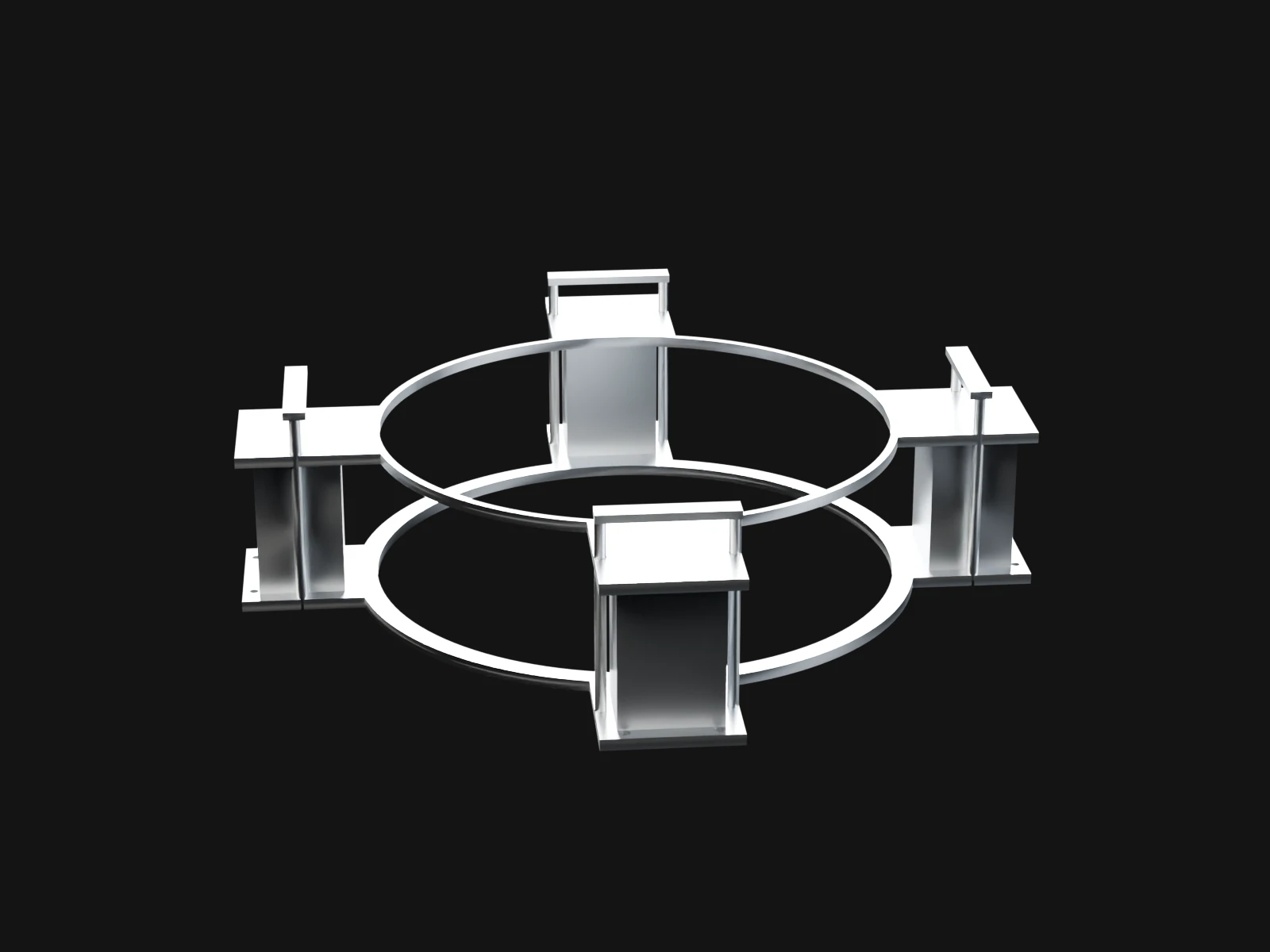 Two silver rings joined by four guide blocks