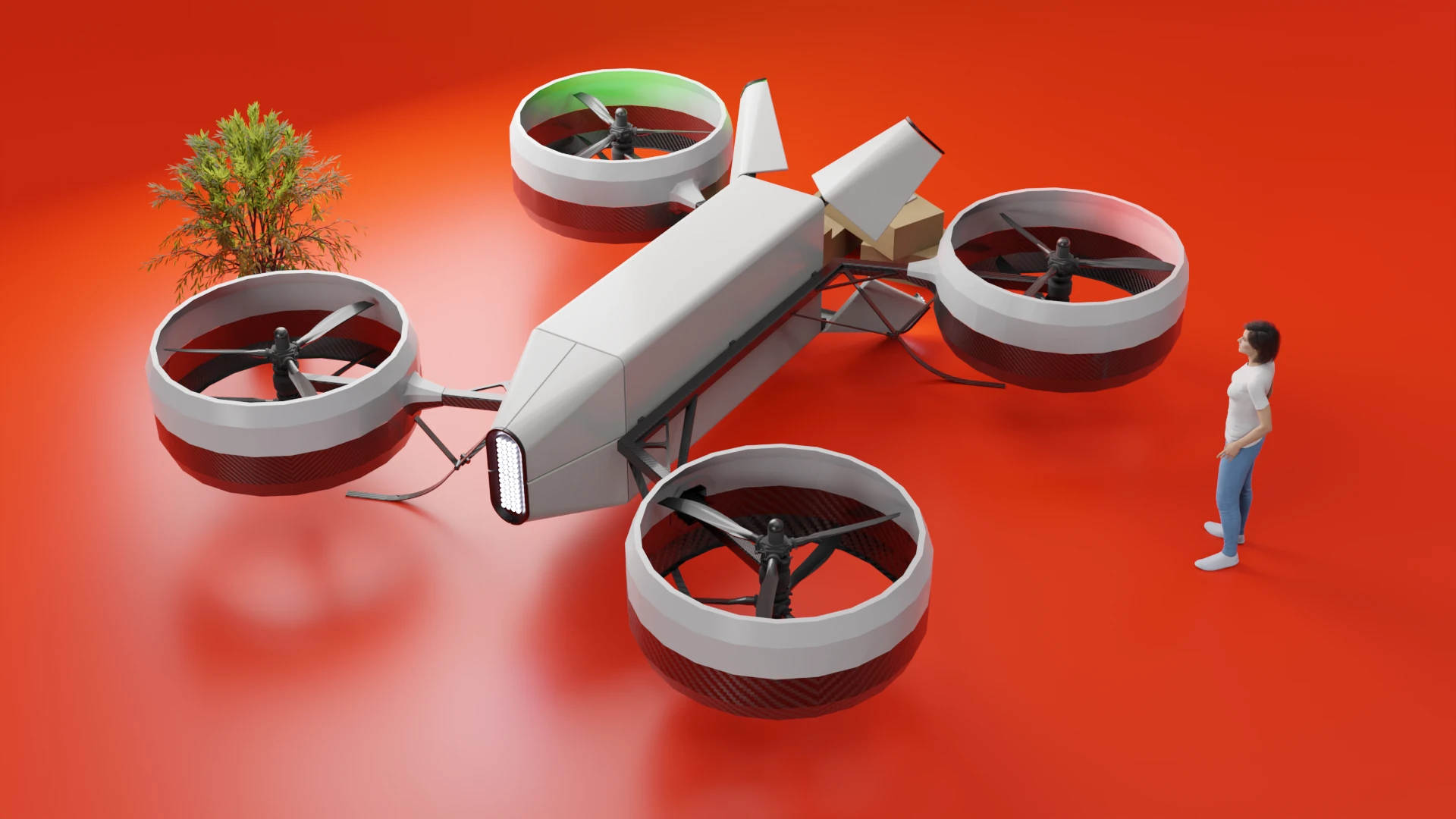 The 2017 render of Spiro: a white rectangular fuselage with four ducted rotors on arms, on a red floor beside a person and a small tree