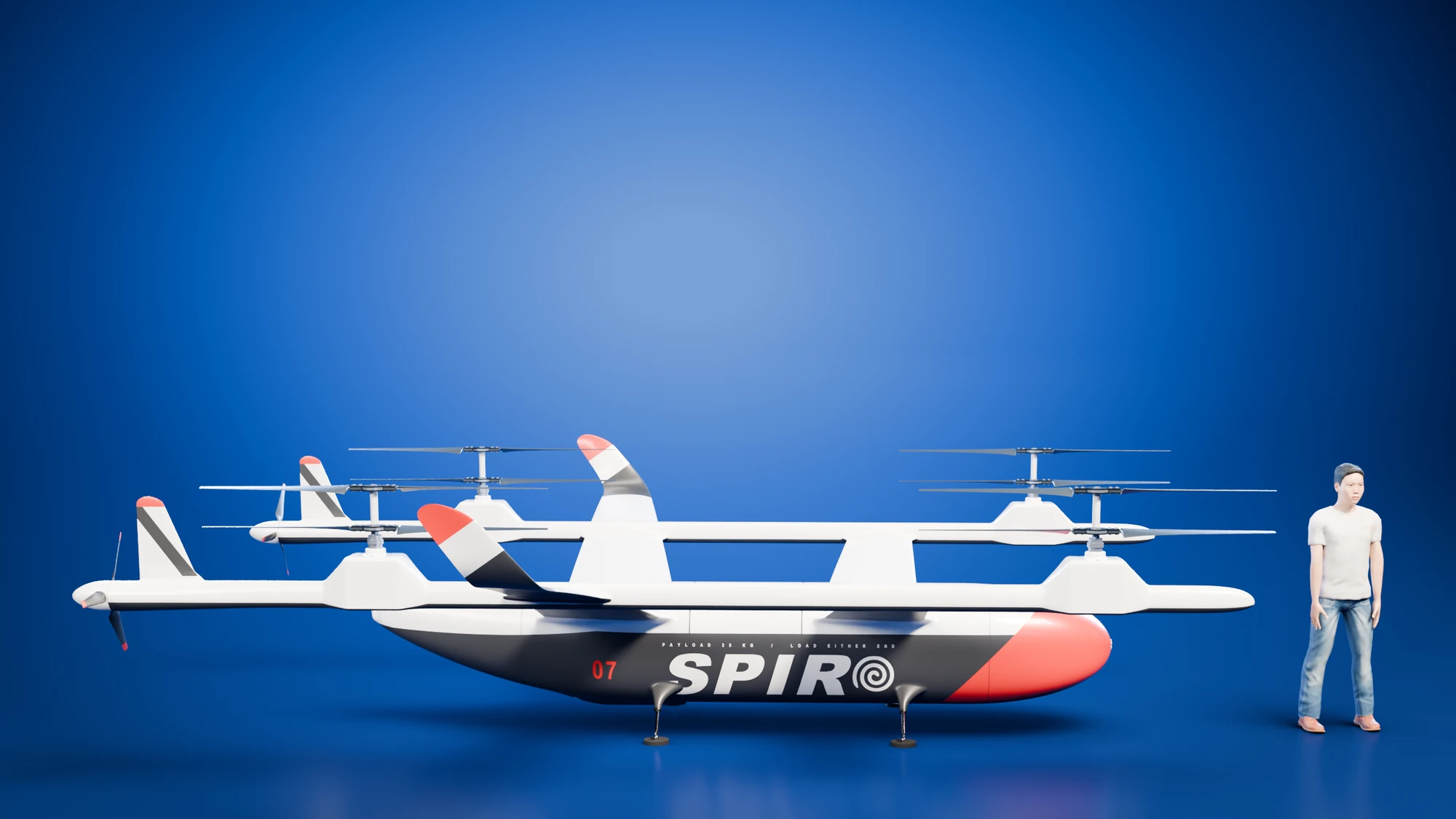 The tandem-wing VTOL beside a clothed standing human figure, both at the same physical scale