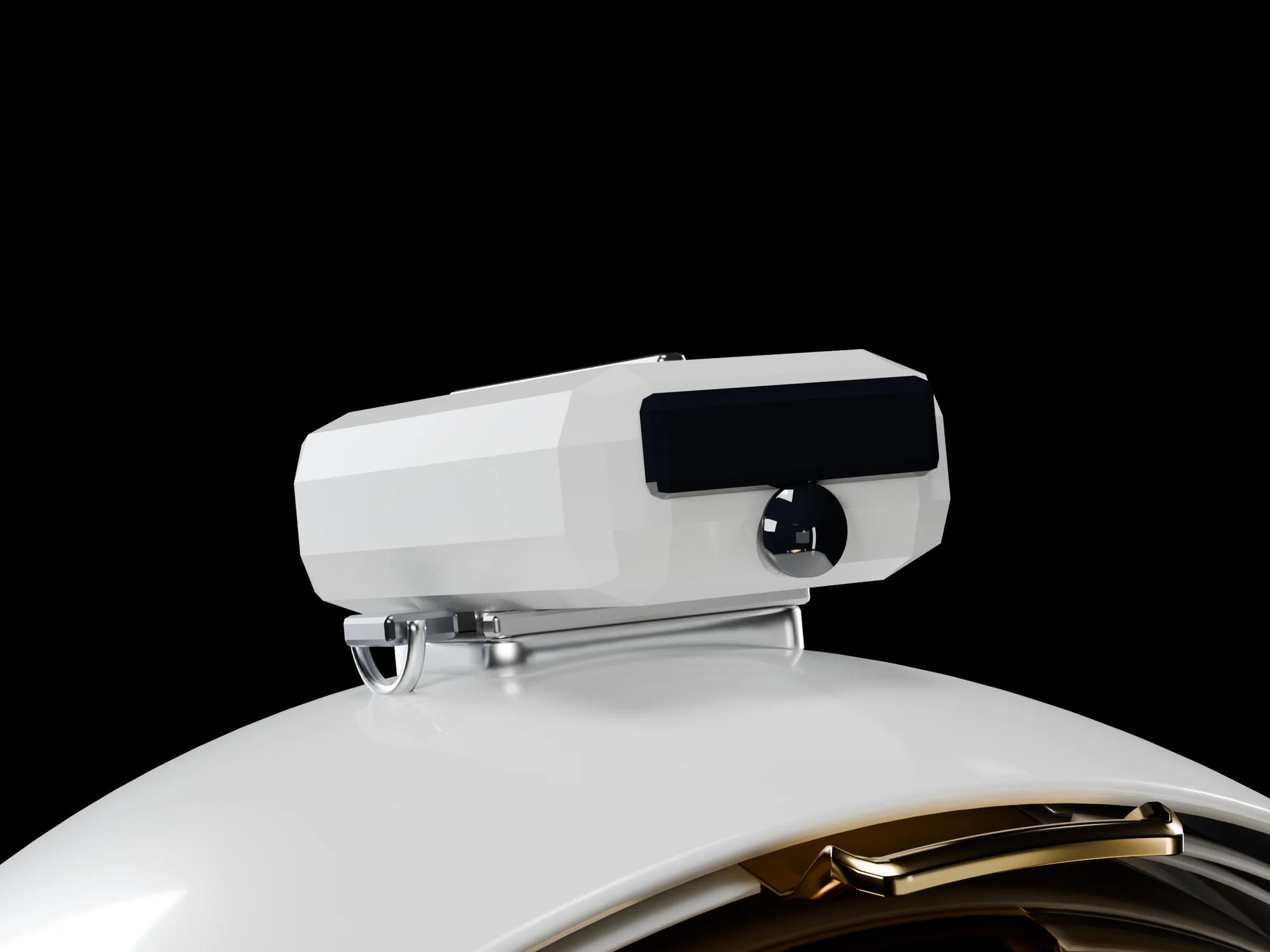 The crown module seen low and from the front, standing above the shell against the dark: a white faceted housing with a black lidar window and a small round camera, on a metal shoe