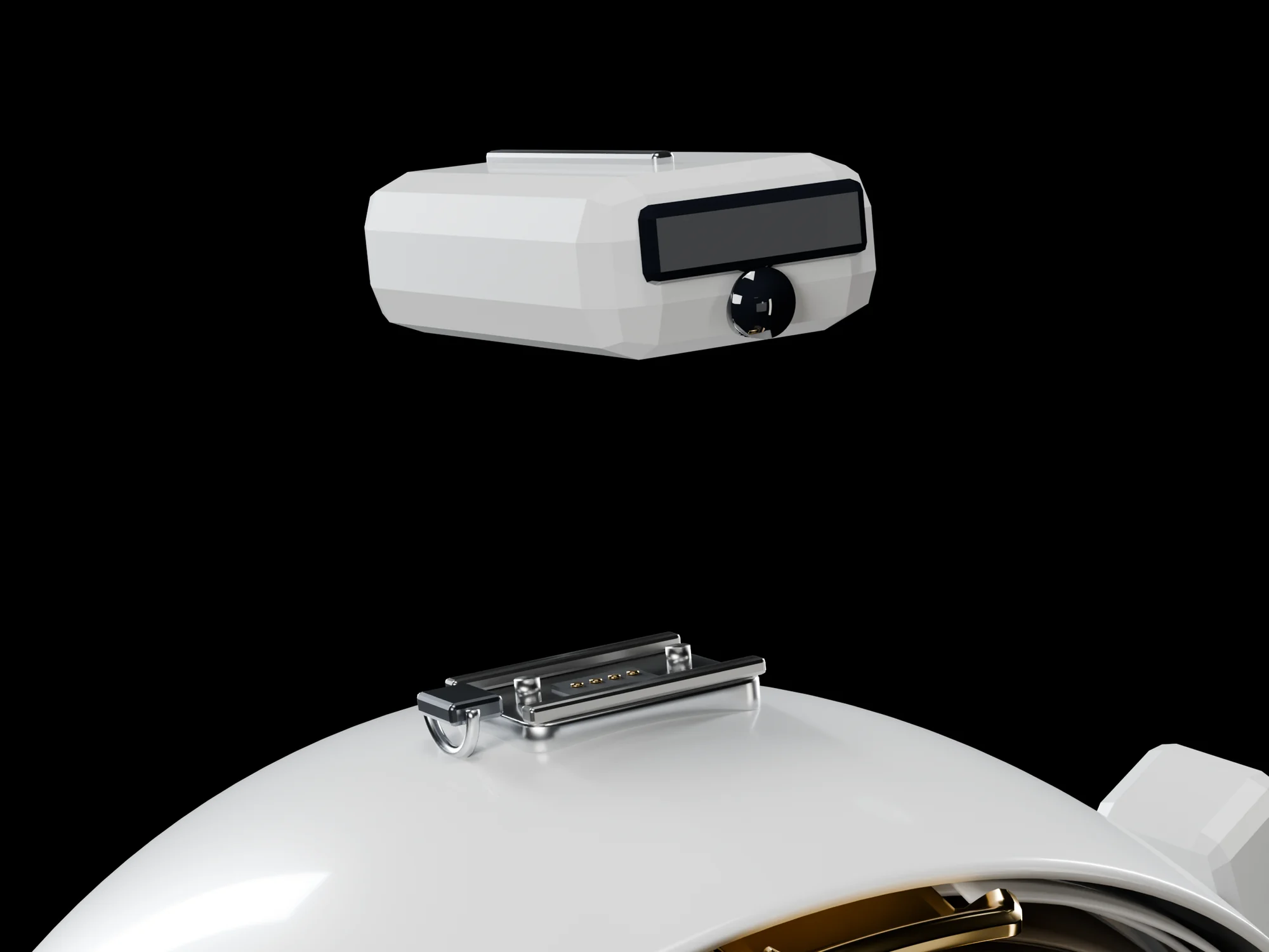 The crown module lifted off the helmet, showing the metal shoe on the shell with two rails, two locating pins, a latch and a row of four gold contacts